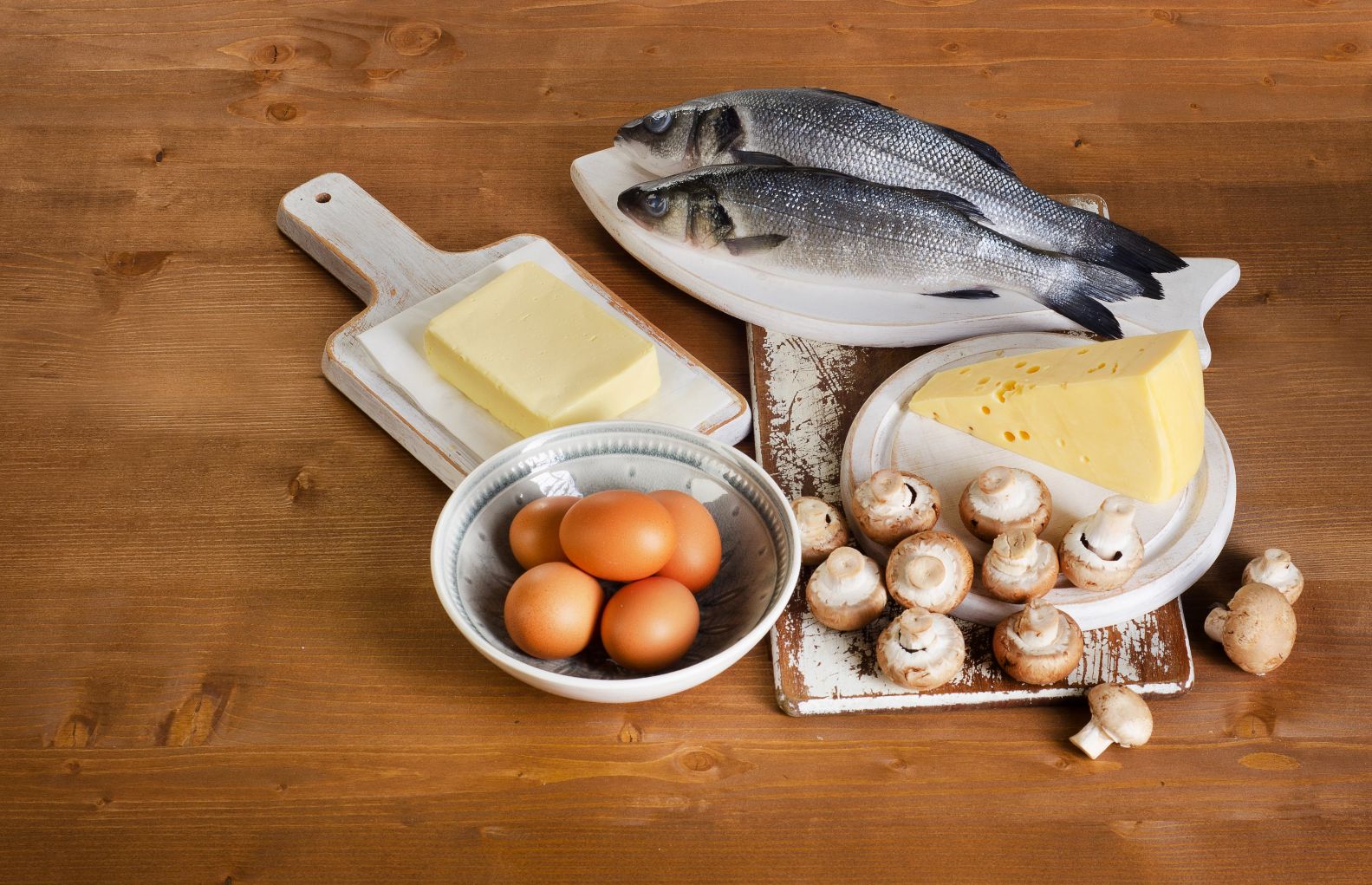 fatty fish, eggs, mushrooms, fortified foods on a kitchen plate